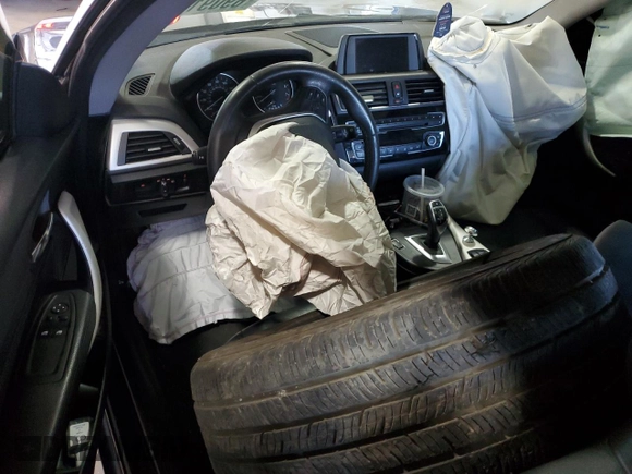 2015 BMW 2 Series 228i xDrive with VIN WBA1G9C51FVX96763, listed as a Copart auction lot 69091454 with 100,816 mi miles and Salvage Title. Bid and sale history available at DreamBid. Image 8.