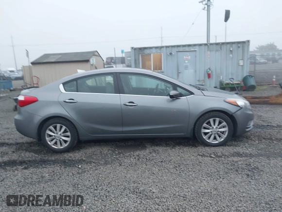 2014 Kia Forte EX with VIN KNAFX4A8XE5213014, listed as a IAAI auction lot 41000589 with 89,890 mi miles. Bid and sale history available at carsss.com. Image 13.