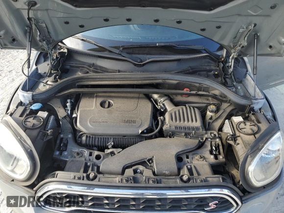 2020 MINI Countryman Cooper S with VIN WMZYW7C06L3L94600, listed as a Copart auction lot 77323534 with 95,926 mi miles and Salvage title. Bid and sale history available at DreamBid. Image 12.