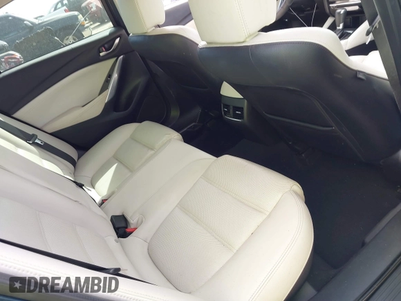 2016 Mazda 6 i Grand Touring with VIN JM1GJ1W59G1439075, listed as a IAAI auction lot 41792755 with 99,215 mi miles and . Bid and sale history available at DreamBid. Image 8.