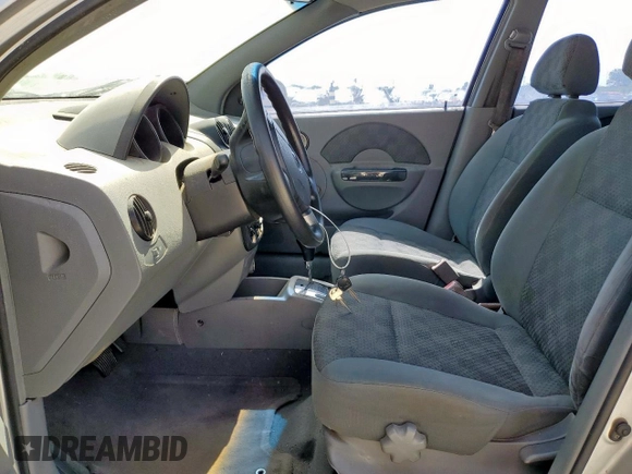 2005 Chevrolet Aveo LS with VIN KL1TD62665B359524, listed as a Copart auction lot 64398555 with 166,819 mi miles and Salvage title. Bid and sale history available at DreamBid. Image 7.