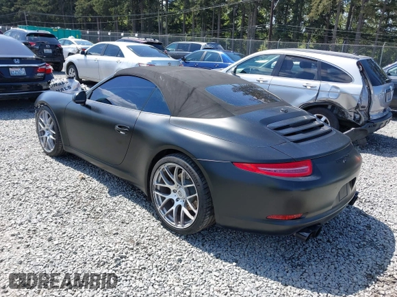 2014 Porsche 911 Carrera z VIN WP0CA2A94ES140857, wystawiony jako IAAI lot #42159010 z przebiegiem 46 230 mil mil oraz . Historia ofert i sprzedaży dostępna na DreamBid. Obrazek 3.