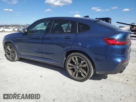 2020 BMW X4 M40i with VIN 5UX2V5C01LLE69394, listed as a Copart auction lot 44036774 with 22,582 mi miles and Clean title. Bid and sale history available at DreamBid. Image 2.