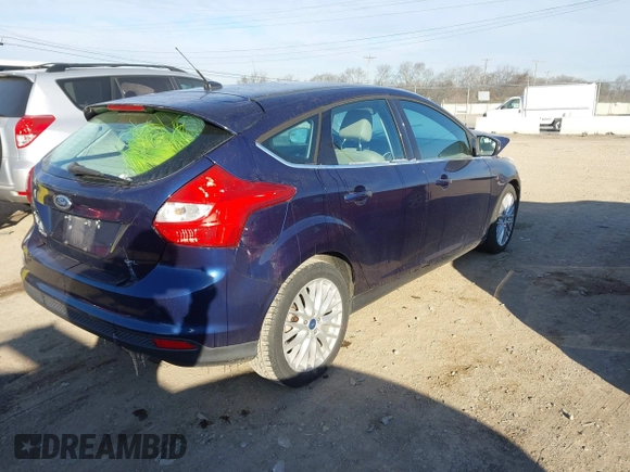 2012 Ford Focus SEL with VIN 1FAHP3M21CL145245, listed as a IAAI auction lot 41320151 with 85,630 mi miles. Bid and sale history available at carsss.com. Image 4.