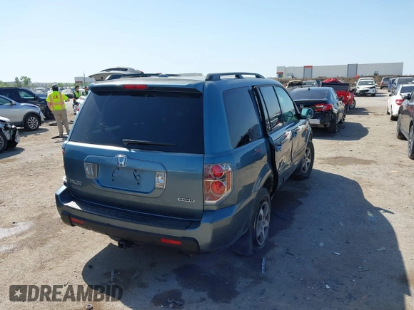 2006 Honda Pilot EX-L with VIN 2HKYF18506H521822, listed as a IAAI auction lot 42012612 with 187,946 mi miles and . Bid and sale history available at DreamBid. Image 4.