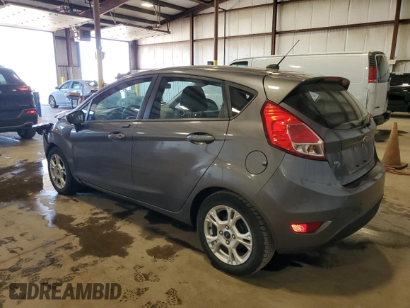 2014 Ford Fiesta SE with VIN 3FADP4EJ7EM232353, listed as a Copart auction lot 54680865 with 52,673 mi miles and Salvage Title. Bid and sale history available at DreamBid. Image 2.