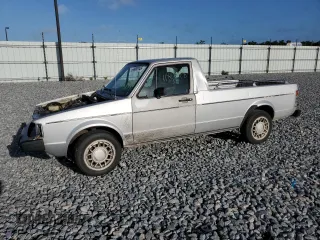 1982 Volkswagen Rabbit z VIN 1MB0174CV060266, wystawiony jako Copart lot #49385145 z przebiegiem 118 498 mil mil oraz Szkody całkowita. Historia ofert i sprzedaży dostępna na DreamBid. Obrazek 1.
