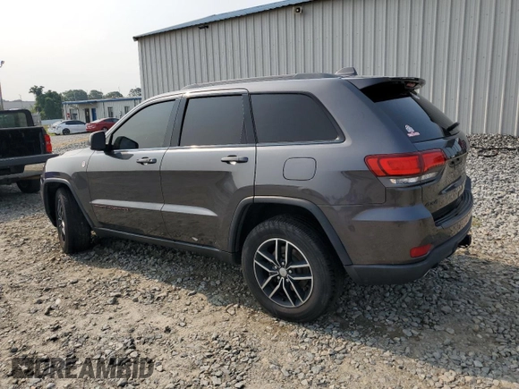 2017 Jeep Grand Cherokee Trailhawk with VIN 1C4RJFLT3HC614449, listed as a Copart auction lot 58559335 with 153,051 mi miles and Salvage title. Bid and sale history available at DreamBid. Image 2.
