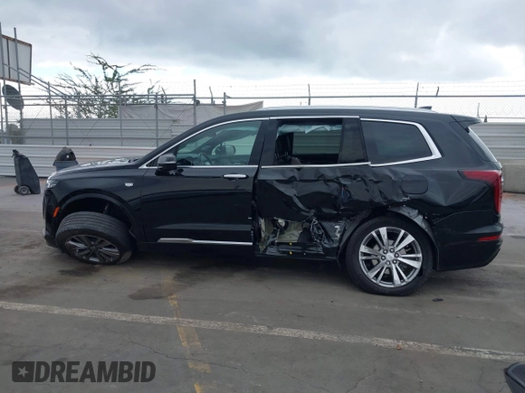 2023 Cadillac XT6 FWD Premium Luxury with VIN 1GYKPCRS5PZ119186, listed as a IAAI auction lot 41456602 with 32,189 mi miles. Bid and sale history available at carsss.com. Image 12.