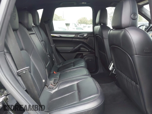 2014 Porsche Cayenne with VIN WP1AA2A29ELA97300, listed as a IAAI auction lot 42106931 with 156,129 mi miles and . Bid and sale history available at DreamBid. Image 8.
