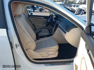 2018 Volkswagen Passat 2.0T S with VIN 1VWAA7A35JC009020, listed as a IAAI auction lot 41955626 with 99,900 mi miles. Bid and sale history available at carsss.com. Image 5.