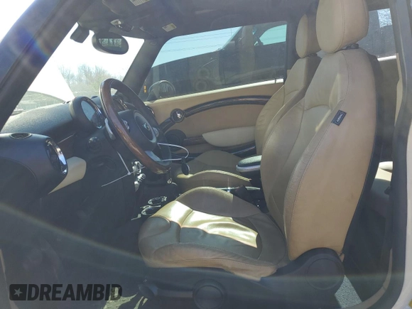 2008 MINI Hardtop with VIN WMWMF33508TT66699, listed as a Copart auction lot 48233985 with 88,817 mi miles and Salvage Title. Bid and sale history available at DreamBid. Image 7.