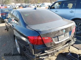 2014 BMW 5 Series 535i with VIN WBA5B1C54ED480604, listed as a IAAI auction lot 41779941 with 146,569 mi miles. Bid and sale history available at carsss.com. Image 3.