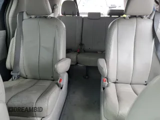 2013 Toyota Sienna XLE z VIN 5TDDK3DC8DS069085, wystawiony jako Copart lot #62768235 z przebiegiem 140 242 mil mil oraz Szkoda całkowita • Salvage title. Historia ofert i sprzedaży dostępna na DreamBid. Obrazek 10.