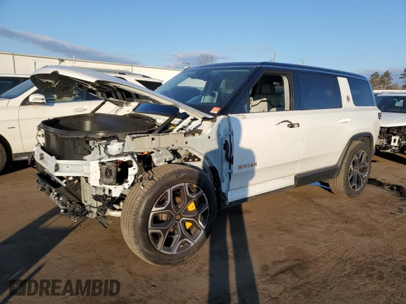 2023 Rivian R1S Launch Edition z VIN 7PDSGABL1PN005988, wystawiony jako Copart lot #42556295 z przebiegiem 19 894 mil mil oraz Szkoda całkowita • Salvage title. Historia ofert i sprzedaży dostępna na DreamBid. Obrazek 1.