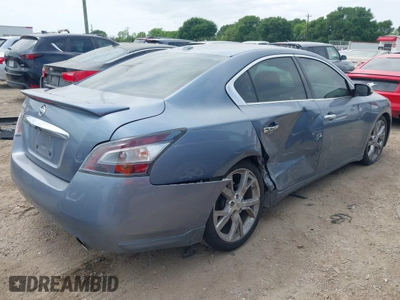 2012 Nissan Maxima SV z VIN 1N4AA5AP4CC823971, wystawiony jako IAAI lot #42021411 z przebiegiem 128 118 mil mil oraz . Historia ofert i sprzedaży dostępna na DreamBid. Obrazek 4.