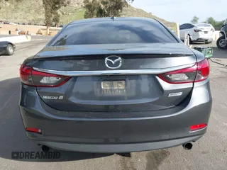 2016 Mazda Mazda6 i Grand Touring with VIN JM1GJ1W57G1441102, listed as a IAAI auction lot 41687057 with 144,876 mi miles. Bid and sale history available at carsss.com. Image 16.