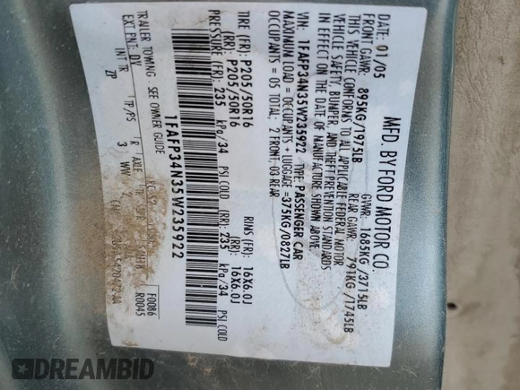 2005 Ford Focus S with VIN 1FAFP34N35W235922, listed as a Copart auction lot 54729854 with Not Provided miles and Salvage Title. Bid and sale history available at carsss.com. Image 12.