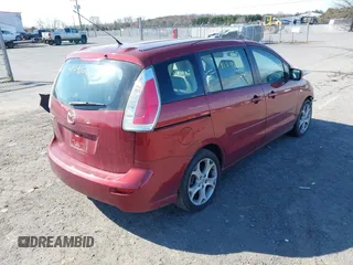 2009 Mazda 5 Touring with VIN JM1CR29L590333609, listed as a IAAI auction lot 41791020 with 118,938 mi miles and . Bid and sale history available at DreamBid. Image 4.