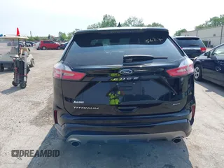 2022 Ford Edge Titanium with VIN 2FMPK4K99NBA12452, listed as a IAAI auction lot 42405627 with 53,015 mi miles and . Bid and sale history available at DreamBid. Image 16.