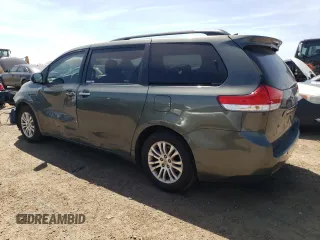 2013 Toyota Sienna XLE AAS с VIN 5TDYK3DC2DS313685, выставлен на аукционе Copart как лот 56064505 с пробегом 115 624 миль миль и Списание • Salvage title. История ставок и продаж доступна на DreamBid. Изображение 2.