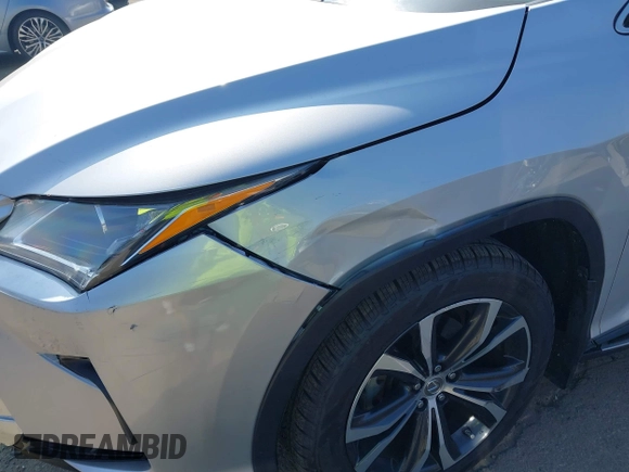 2017 Lexus RX 350 with VIN 2T2ZZMCA7HC061786, listed as a IAAI auction lot 42800283 with 31,300 mi miles and . Bid and sale history available at DreamBid. Image 6.