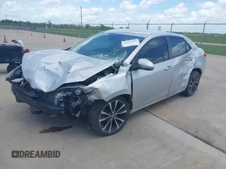 2017 Toyota Corolla L z VIN 5YFBURHE4HP732912, wystawiony jako IAAI lot #42451597 z przebiegiem 73 901 mil mil oraz . Historia ofert i sprzedaży dostępna na DreamBid. Obrazek 2.