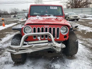 2015 Jeep Wrangler Unlimited Sport z VIN 1C4BJWDG9FL761049, wystawiony jako Copart lot #44188715 z przebiegiem 156 345 mil mil oraz Nie do naprawy • Non repairable. Historia ofert i sprzedaży dostępna na DreamBid. Obrazek 5.