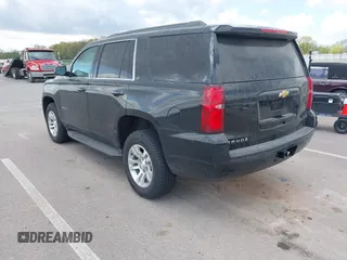2019 Chevrolet Tahoe LT z VIN 1GNSKBKC6KR266831, wystawiony jako IAAI lot #42174593 z przebiegiem 103 199 mil mil oraz . Historia ofert i sprzedaży dostępna na DreamBid. Obrazek 3.