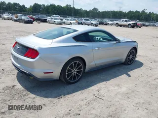 2018 Ford Mustang EcoBoost with VIN 1FA6P8TH4J5146966, listed as a IAAI auction lot 42583004 with 95,775 mi miles and . Bid and sale history available at DreamBid. Image 4.