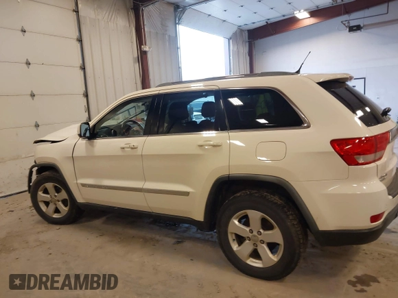 2011 Jeep Grand Cherokee 70th Anniversary with VIN 1J4RR4GG4BC702759, listed as a IAAI auction lot 41871604 with 143,583 mi miles. Bid and sale history available at carsss.com. Image 14.