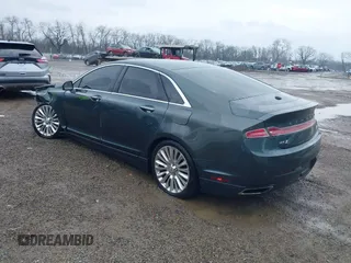 2015 Lincoln MKZ z VIN 3LN6L2J90FR616800, wystawiony jako IAAI lot #41683401 z przebiegiem 92 239 mil mil oraz . Historia ofert i sprzedaży dostępna na DreamBid. Obrazek 3.