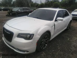 2016 Chrysler 300 with VIN 2C3CCAGG1GH274296, listed as a IAAI auction lot 40455490 with 142,235 mi miles. Bid and sale history available at carsss.com. Image 2.