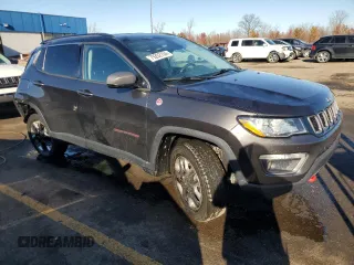 2018 Jeep Compass Trailhawk with VIN 3C4NJDDB4JT192663, listed as a Copart auction lot 79202704 with 73,665 mi miles and Salvage title. Bid and sale history available at DreamBid. Image 4.