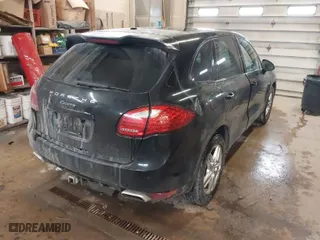 2014 Porsche Cayenne Diesel with VIN WP1AF2A27ELA31605, listed as a IAAI auction lot 41391161 with 299,774 mi miles. Bid and sale history available at carsss.com. Image 4.