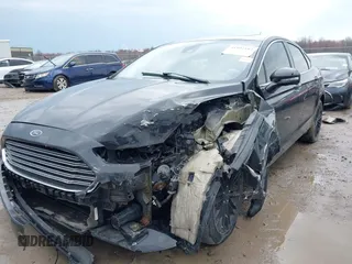 2015 Ford Fusion SE z VIN 3FA6P0H98FR273212, wystawiony jako IAAI lot #41952167 z przebiegiem 123 359 mil mil oraz . Historia ofert i sprzedaży dostępna na DreamBid. Obrazek 2.