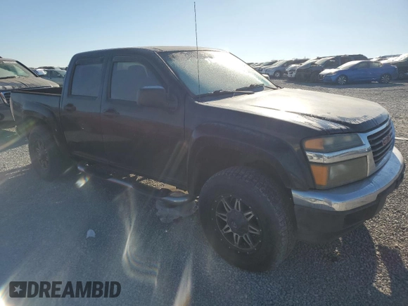 2005 GMC Canyon 1SE SLE Z71 with VIN 1GTDS136258288484, listed as a Copart auction lot 82838724 with 206,555 mi miles and Salvage Title. Bid and sale history available at carsss.com. Image 4.