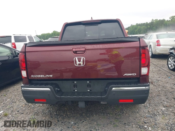 2020 Honda Ridgeline RTL-E with VIN 5FPYK3F7XLB012298, listed as a IAAI auction lot 42230880 with 48,252 mi miles and . Bid and sale history available at DreamBid. Image 16.
