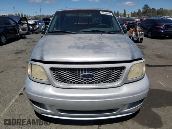 1999 Ford F-150 XL с VIN 1FTRX17L1XKC25356, выставлен на аукционе Copart как лот 65149275 с пробегом 205 482 миль миль и Чистый • Clean title. История ставок и продаж доступна на DreamBid. Изображение 5.