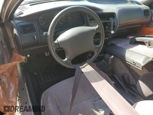 1995 Toyota Corolla DX with VIN 2T1AE09B0SC098739, listed as a Copart auction lot 57653205 with 154,226 mi miles and Salvage title. Bid and sale history available at DreamBid. Image 8.