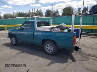 1997 Nissan Frontier XE with VIN 1N6SD11SXVC332100, listed as a Copart auction lot 54330245 with 203,959 mi miles and Salvage title. Bid and sale history available at DreamBid. Image 2.