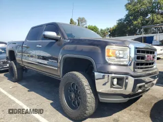 2014 GMC Sierra 1500 SLT with VIN 3GTU2VEC4EG224564, listed as a Copart auction lot 61299875 with 136,539 mi miles and Salvage title. Bid and sale history available at DreamBid. Image 4.