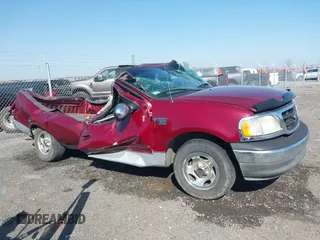 2003 Ford F-150 XL with VIN 1FTRF17W63NA02400, listed as a IAAI auction lot 41752364 with 209,947 mi miles and . Bid and sale history available at DreamBid. Image 13.