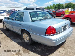 2008 Ford Crown Victoria z VIN 2FAFP73V28X126398, wystawiony jako IAAI lot #42349725 z przebiegiem Nie podano mil oraz . Historia ofert i sprzedaży dostępna na DreamBid. Obrazek 3.