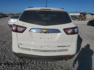2015 Chevrolet Traverse LTZ with VIN 1GNKVJKD5FJ248402, listed as a Copart auction lot 47138305 with 140,808 mi miles and Salvage Title. Bid and sale history available at DreamBid. Image 6.