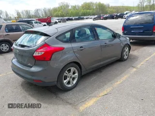 2014 Ford Focus SE with VIN 1FADP3K2XEL326882, listed as a IAAI auction lot 42183188 with 101,450 mi miles and . Bid and sale history available at carsss.com. Image 4.