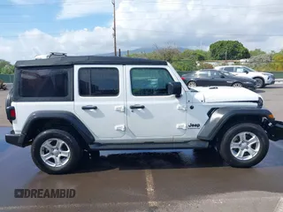 2023 Jeep Wrangler Willys with VIN 1C4HJXDG5PW566145, listed as a IAAI auction lot 41912872 with 50,290 mi miles and . Bid and sale history available at DreamBid. Image 13.