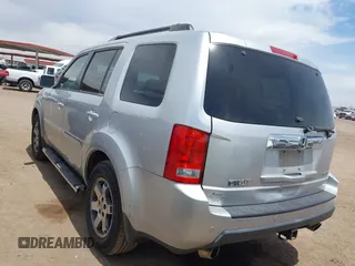 2011 Honda Pilot Touring z VIN 5FNYF3H90BB006634, wystawiony jako IAAI lot #42388390 z przebiegiem 218 475 mil mil oraz . Historia ofert i sprzedaży dostępna na DreamBid. Obrazek 3.