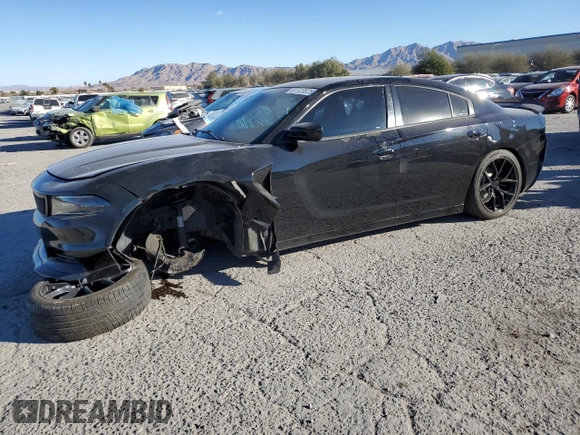 2015 Dodge Charger SXT with VIN 2C3CDXHG8FH769883, listed as a Copart auction lot 87723825 with 81,859 mi miles and Salvage Title. Bid and sale history available at DreamBid. Image 1.