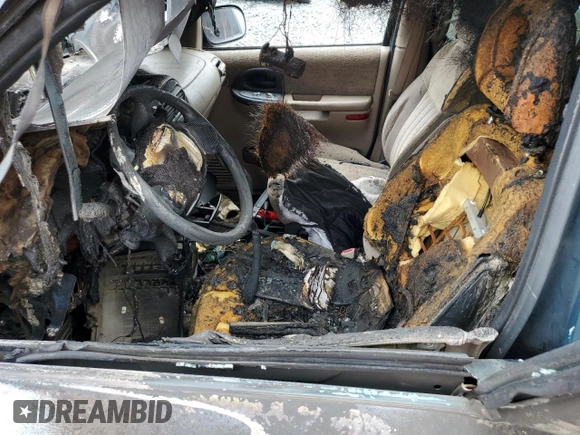 1999 Pontiac Montana z VIN 1GMDX03E2XD172078, wystawiony jako Copart lot #59478494 z przebiegiem Nie podano mil oraz Nie do naprawy • Non repairable. Historia ofert i sprzedaży dostępna na DreamBid. Obrazek 7.